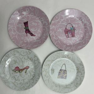 Set of 4 Creativetops plates. In excellent condition used once.